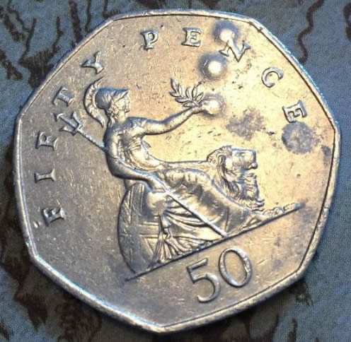 Mint-Error-Or-Drilled?