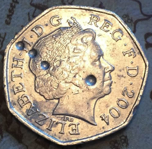 Mint-Error-Or-Drilled?