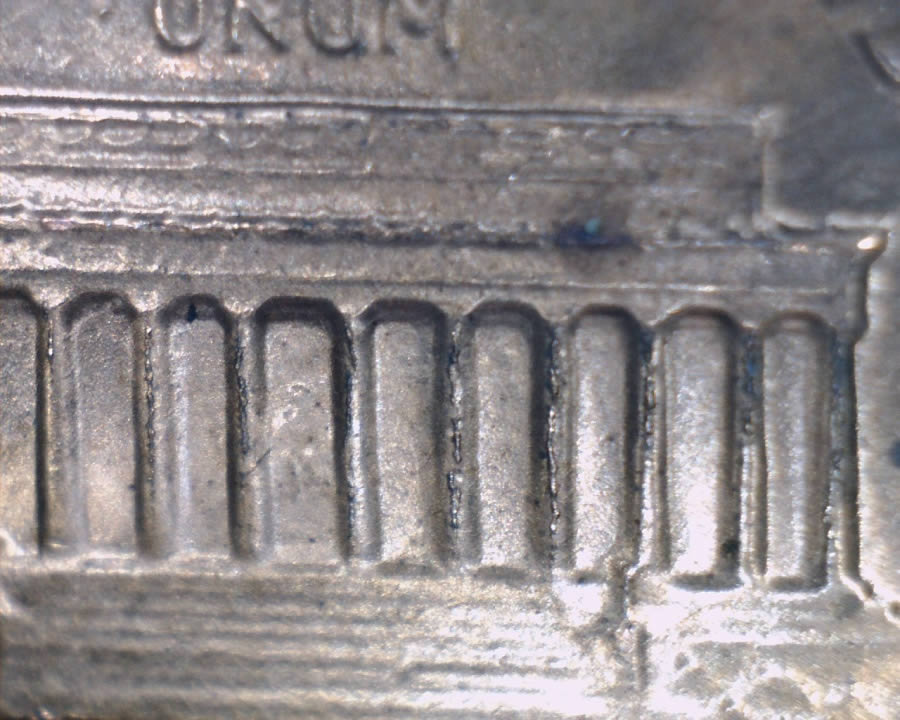1983-D-LMC-Bleeding-Zinc-From-Memorial-Columns