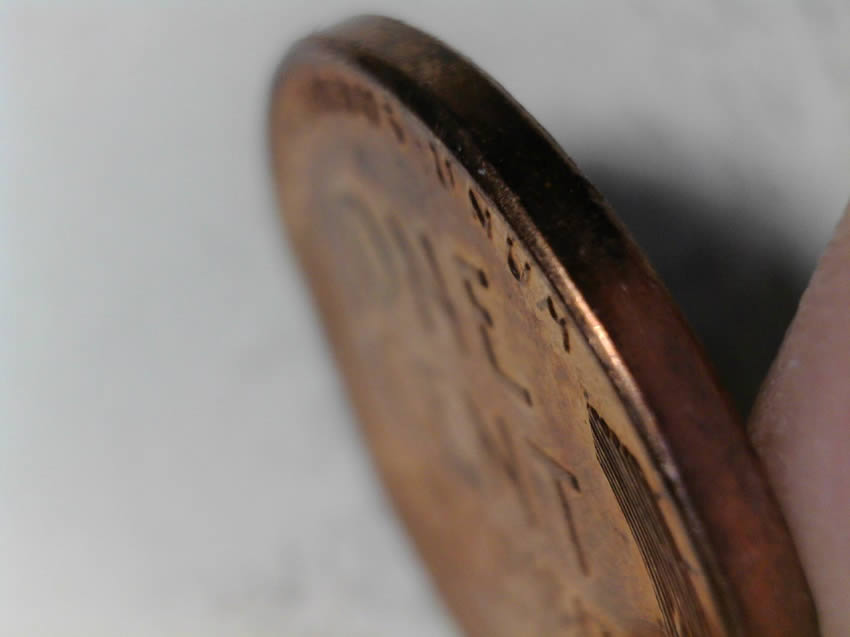 1957-D-Cent-Clipped-Planchet-With-Blakesly-Effect