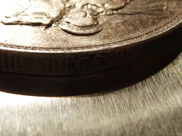Help-With-A-Coin-And-Amazingly-Resilient-Tape-Residue