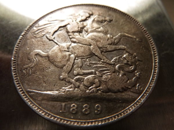 Help-With-A-Coin-And-Amazingly-Resilient-Tape-Residue