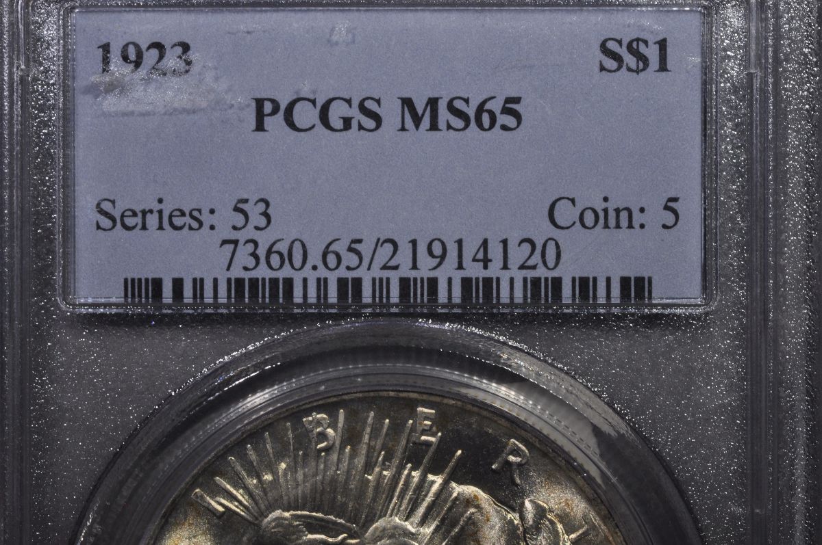2-1923-Peace-Dollars-One-Raw-One-PCGS