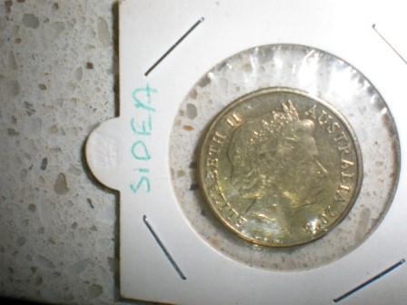 1995-20c-Struck-On-A-Thai-Temple-Token-A-Double-Head-$1-2008