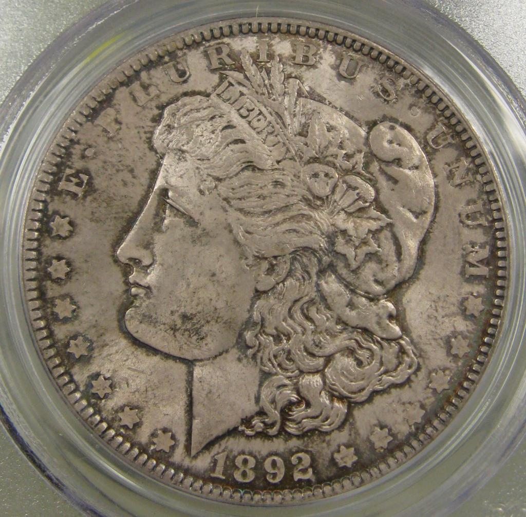 Counterfeit-1892-P-Morgan-Dollar-And-Holder?