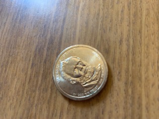 1-Dollar-Gold-Coin-With-Real-Looking-Eyes-2011