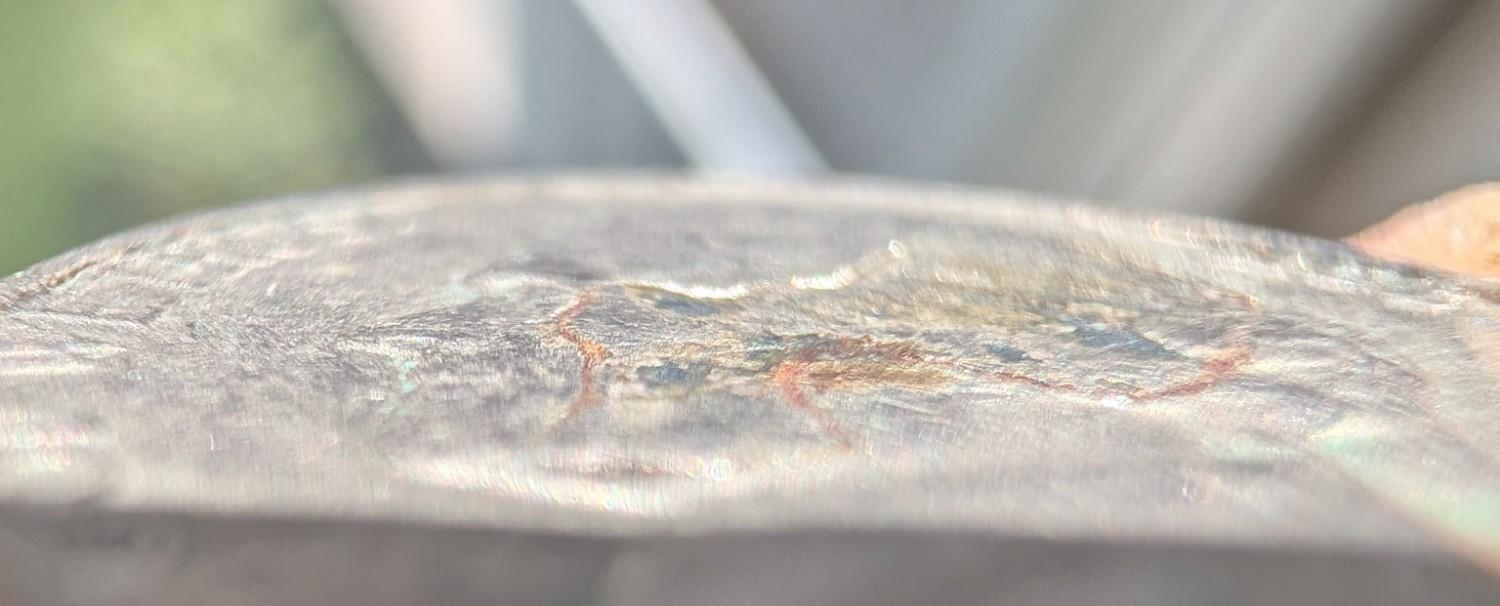 Jefferson-Nickel-Struck-In-Metal-Fragment