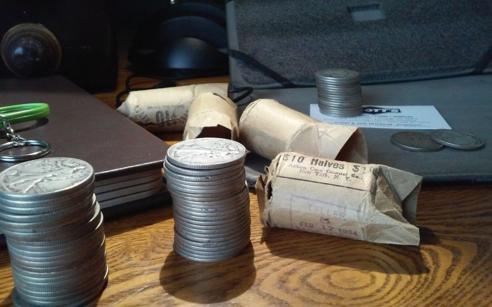 Small-Horde-Of-Morgans-And-Peace-Dollars