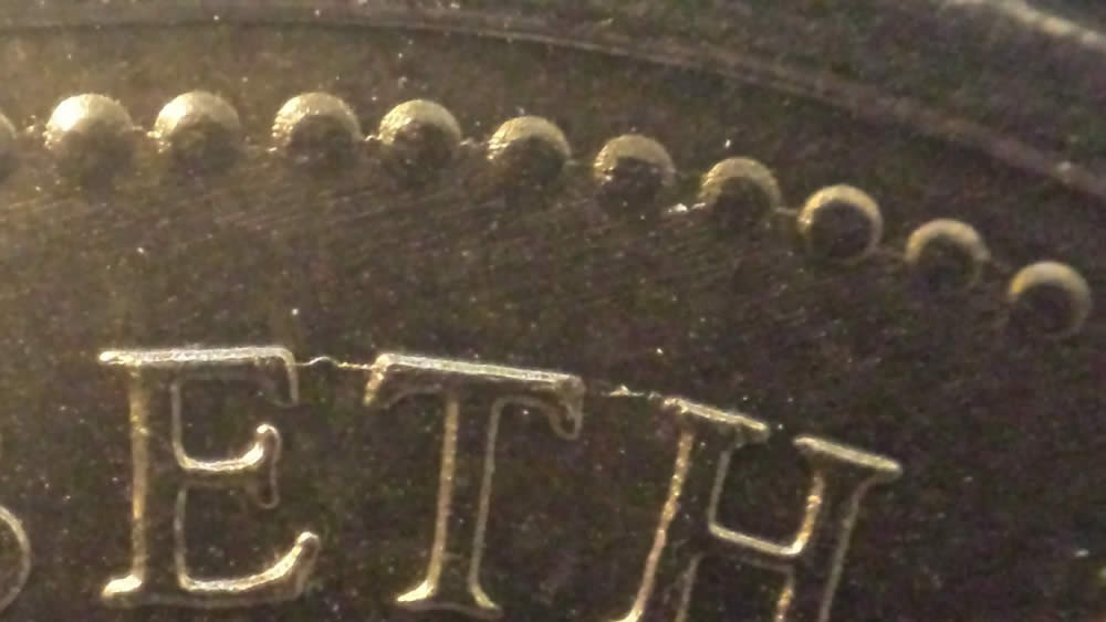 1973-PEI-Nickel-BU-Dollar-Obverse-Doubling-Eth-Die-Crack