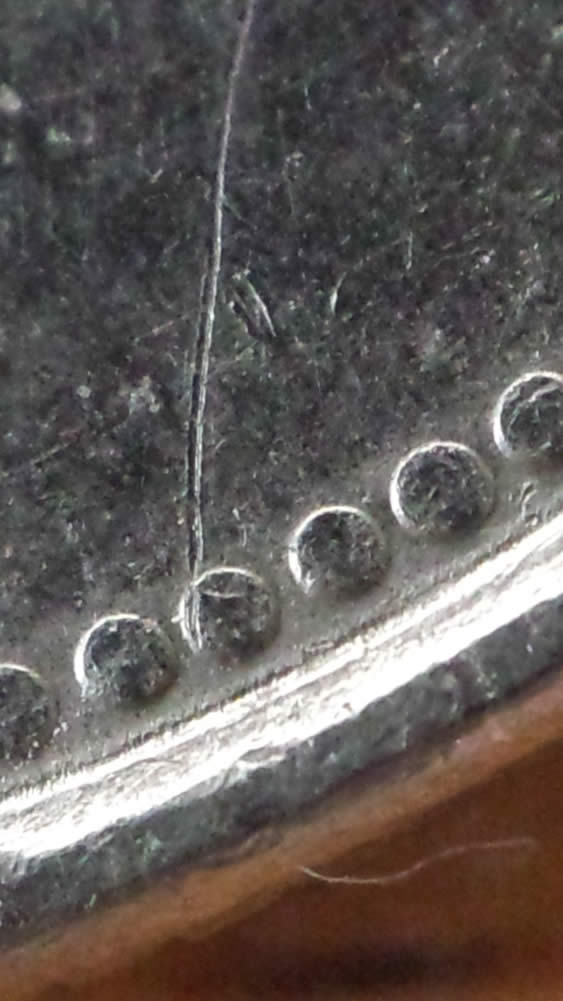 Strike-Through-Or-Scratch--->-Mountie-Quarter