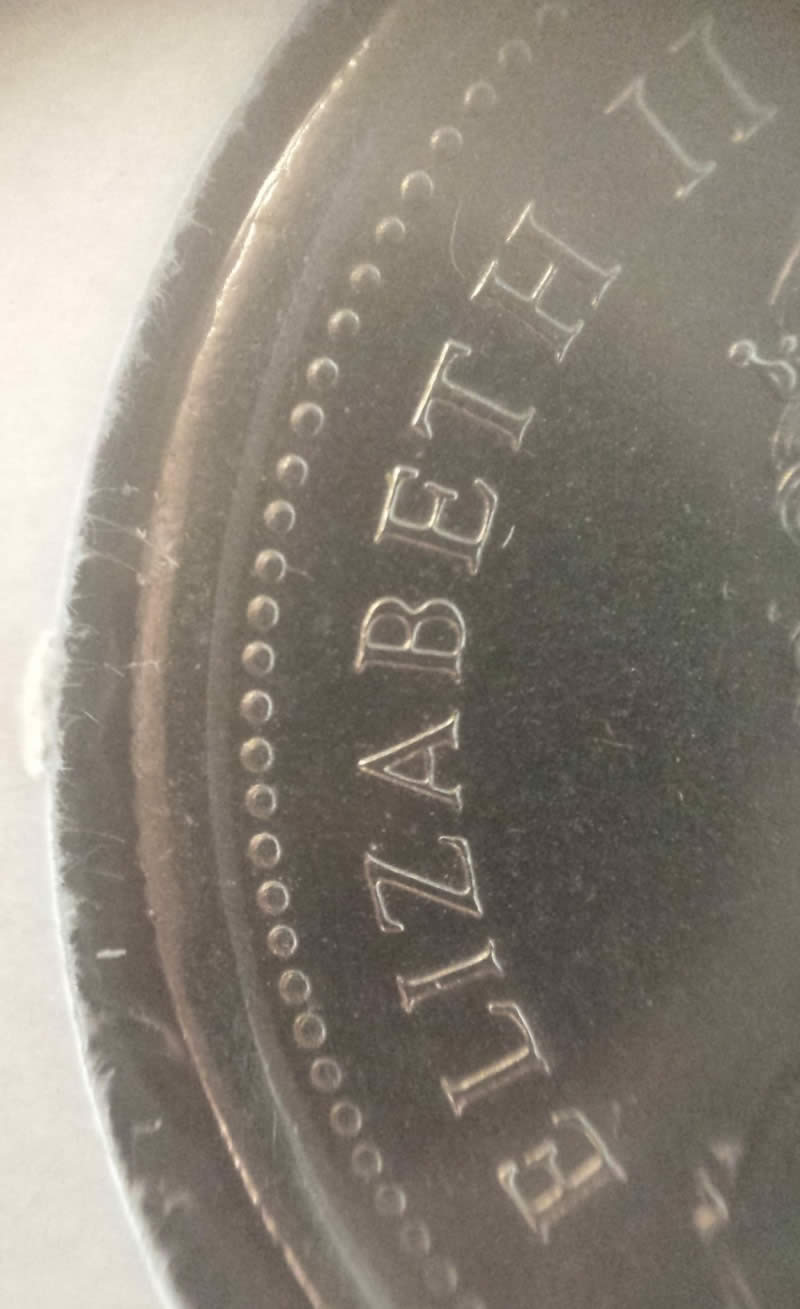 1973-Mountie-Quarter-Clipped-Planchet