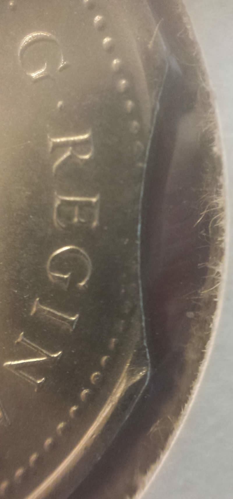 1973-Mountie-Quarter-Clipped-Planchet