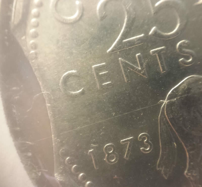 1973-Mountie-Quarter-Clipped-Planchet