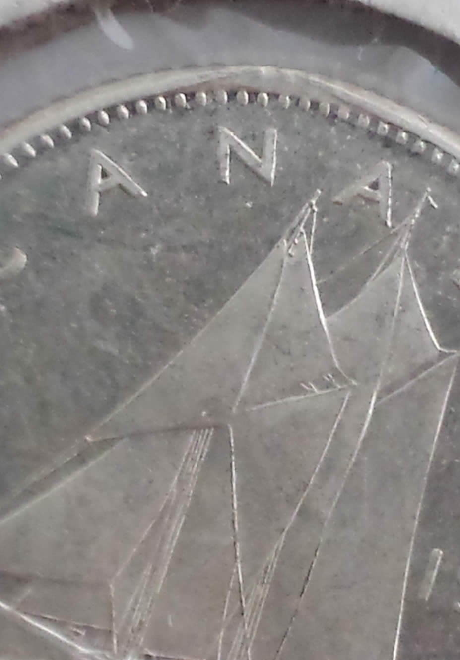 1965-Dime-Clipped-Planchet-With-Nice-Blakesley