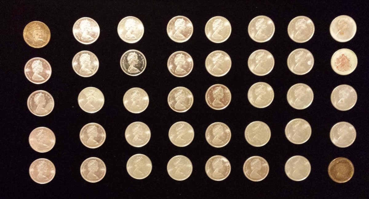 1968-Roll-Of-Silver-Quarters---Broken-Open-Pictures