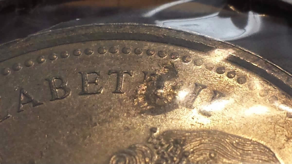 1974-Nickel-Dollar-With-Obverse-Planchet-Flaw-Or-Strike-Through