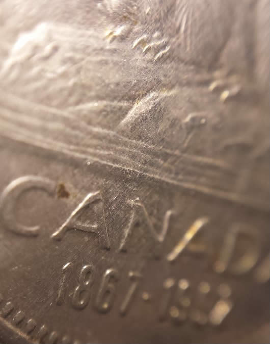 1992-5-Cents-Parallel-Striations-From-Field-Through-Devices-On-Reverse