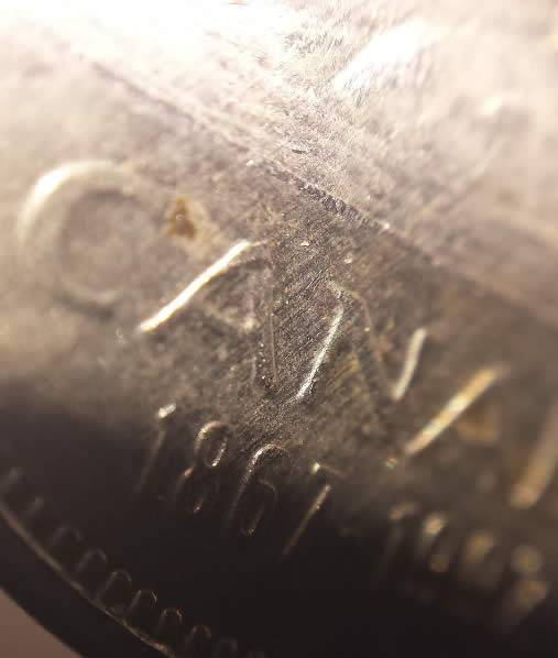 1992-5-Cents-Parallel-Striations-From-Field-Through-Devices-On-Reverse