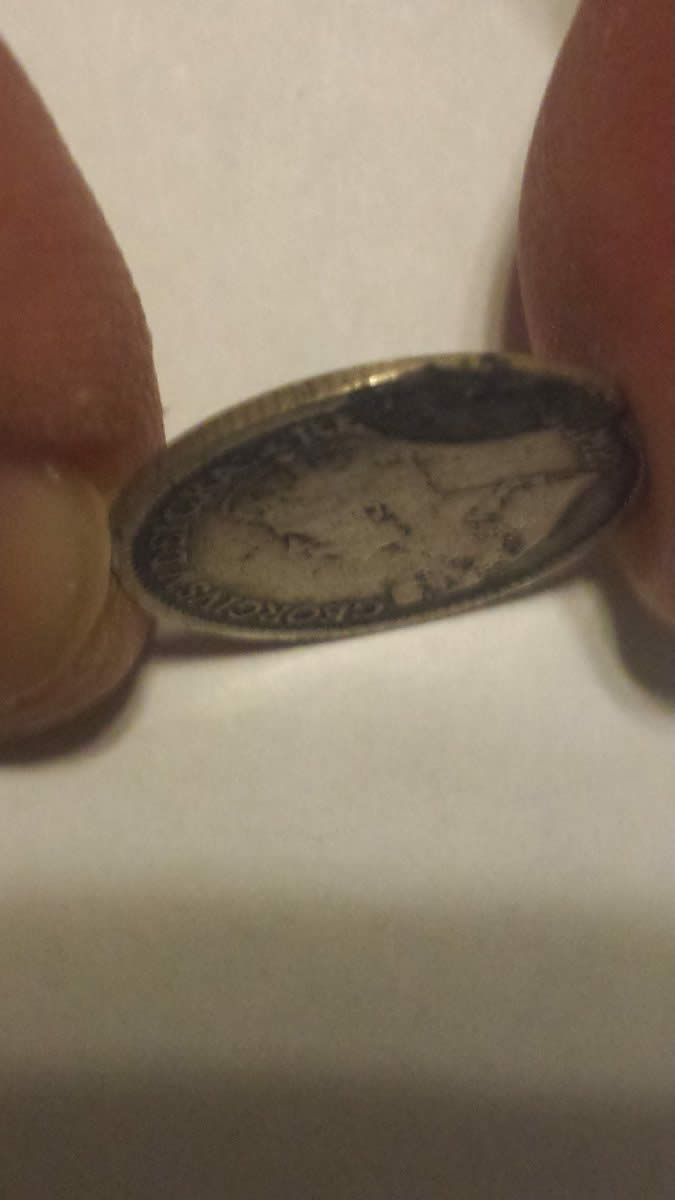 1915-5-Cents-With-Obverse-Planchet-Flaw---Indent-Strike-Or-Delamination