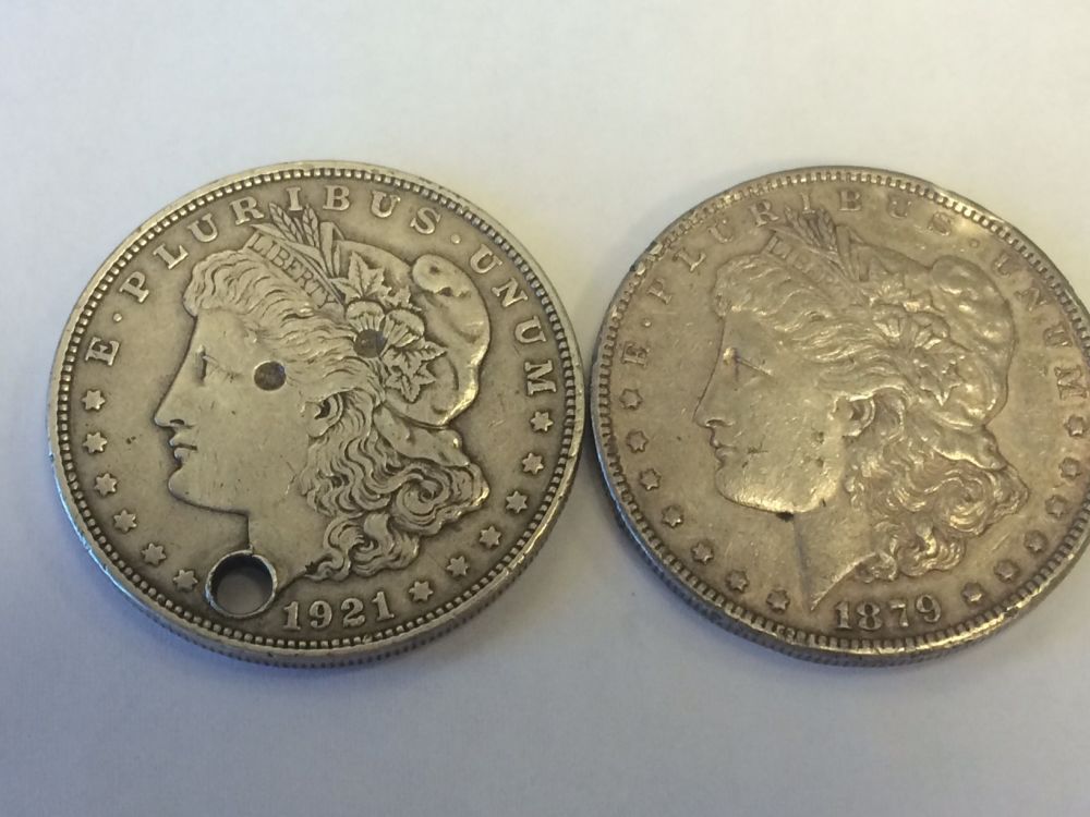 Damaged-1879-And-1921-Morgans