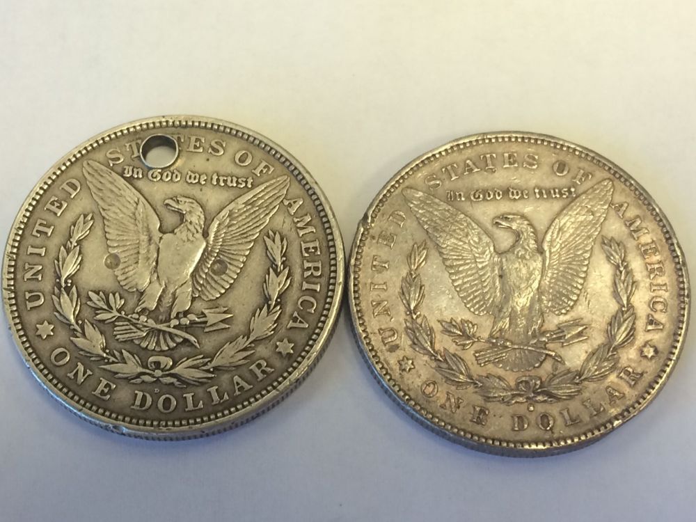 Damaged-1879-And-1921-Morgans