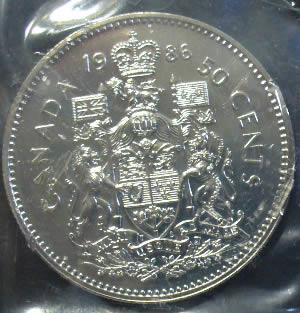 1986-PL-Coin-Sealed-With-Damage..50-Cent-Piece..