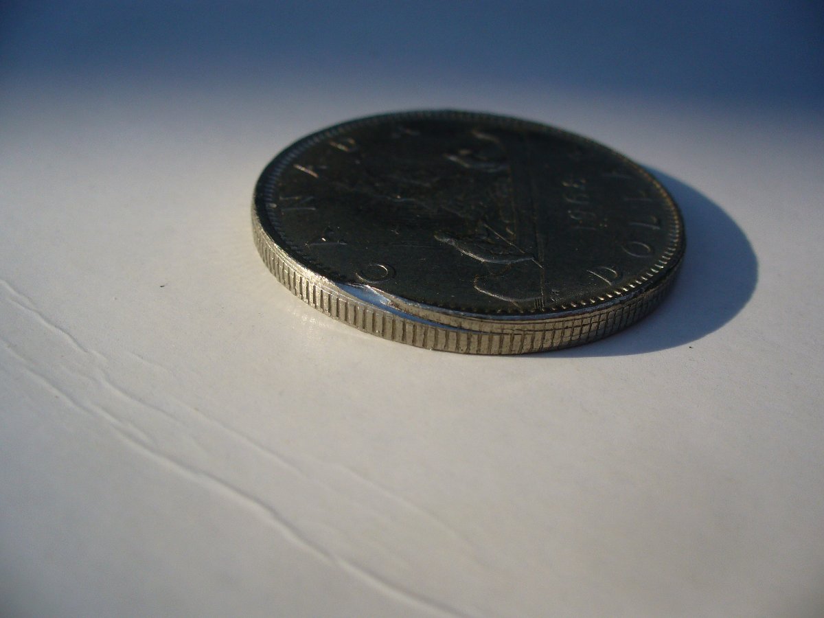 1968-Canada-Nickel-Dollar--Looking-For-An-Explantion.