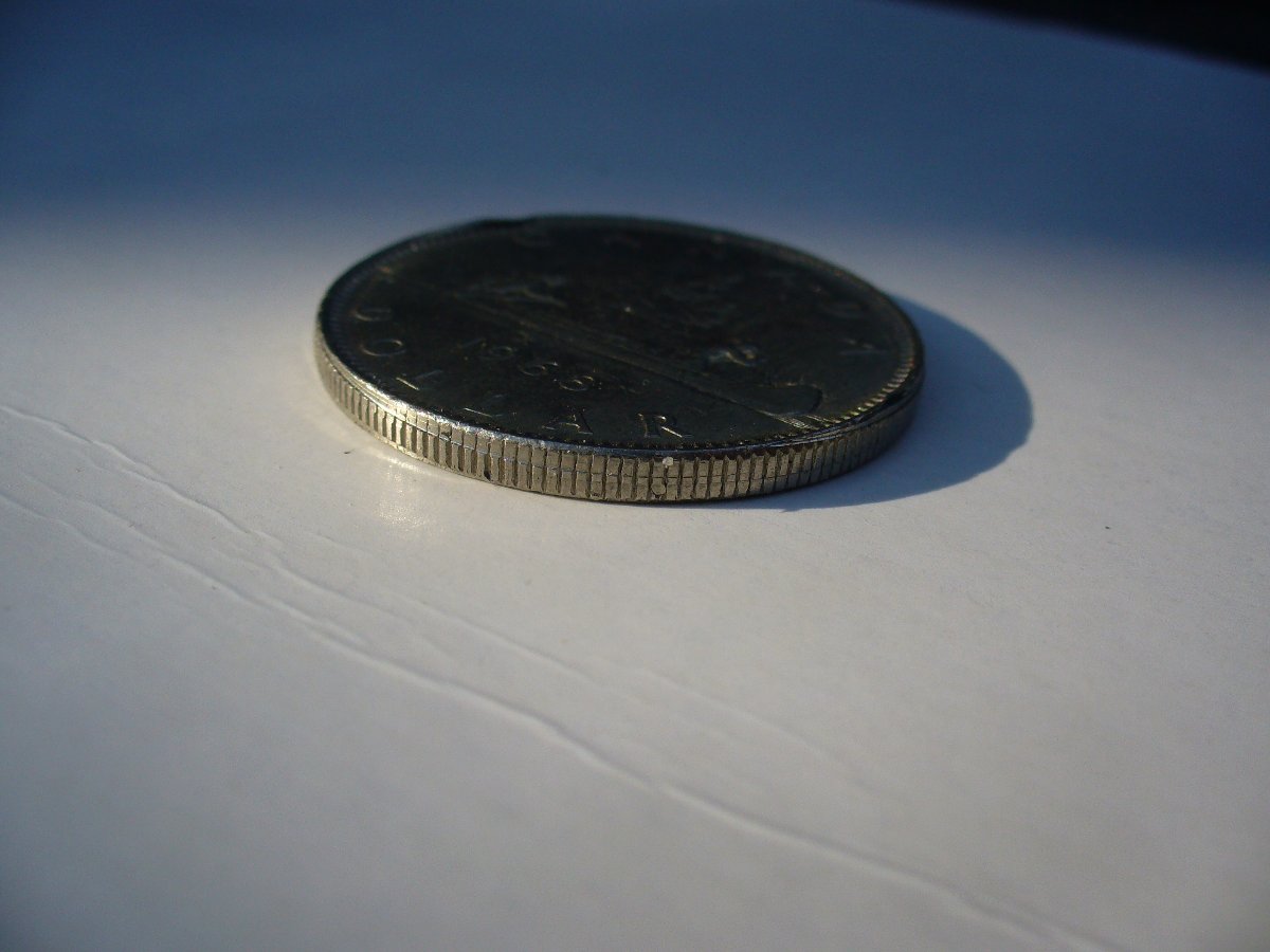 1968-Canada-Nickel-Dollar--Looking-For-An-Explantion.