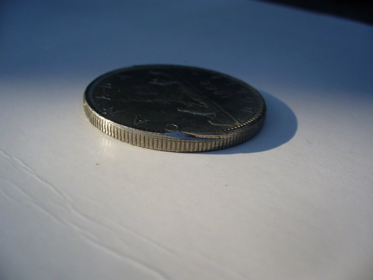 1968-Canada-Nickel-Dollar--Looking-For-An-Explantion.