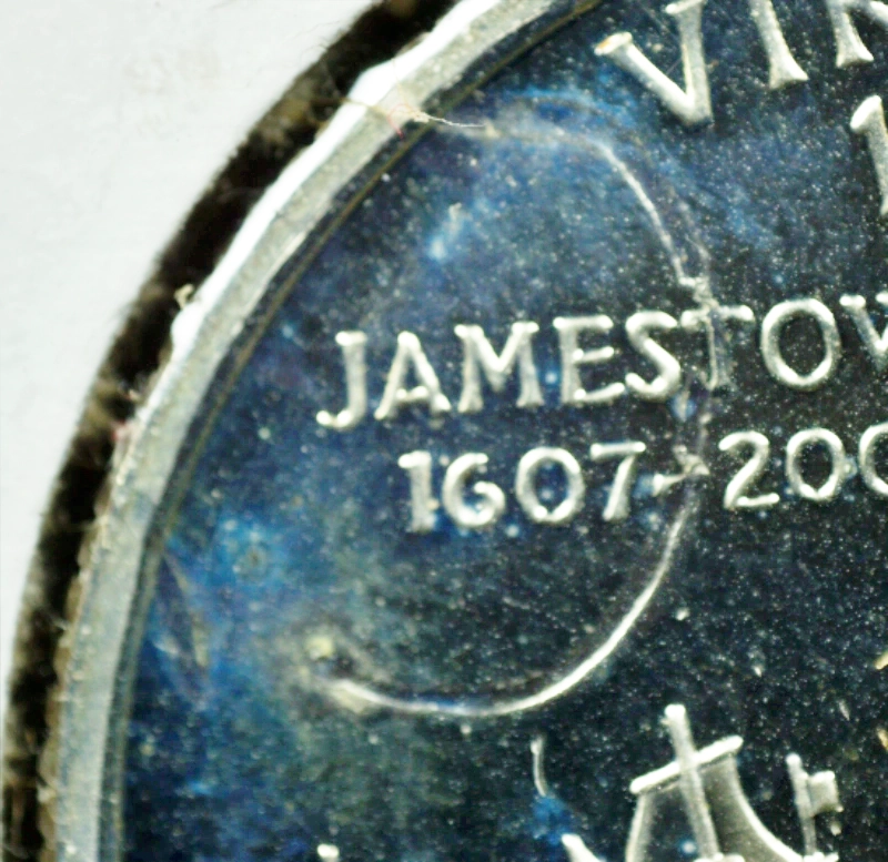 2000-Quarter-PR-Silver-Strike-Through