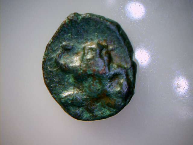 Old-Coin-Whit-Alien-Humanoid-?