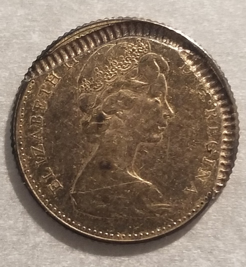 10c-Canadian-1967-Overstruck-With-Laminated-Rim-Strip