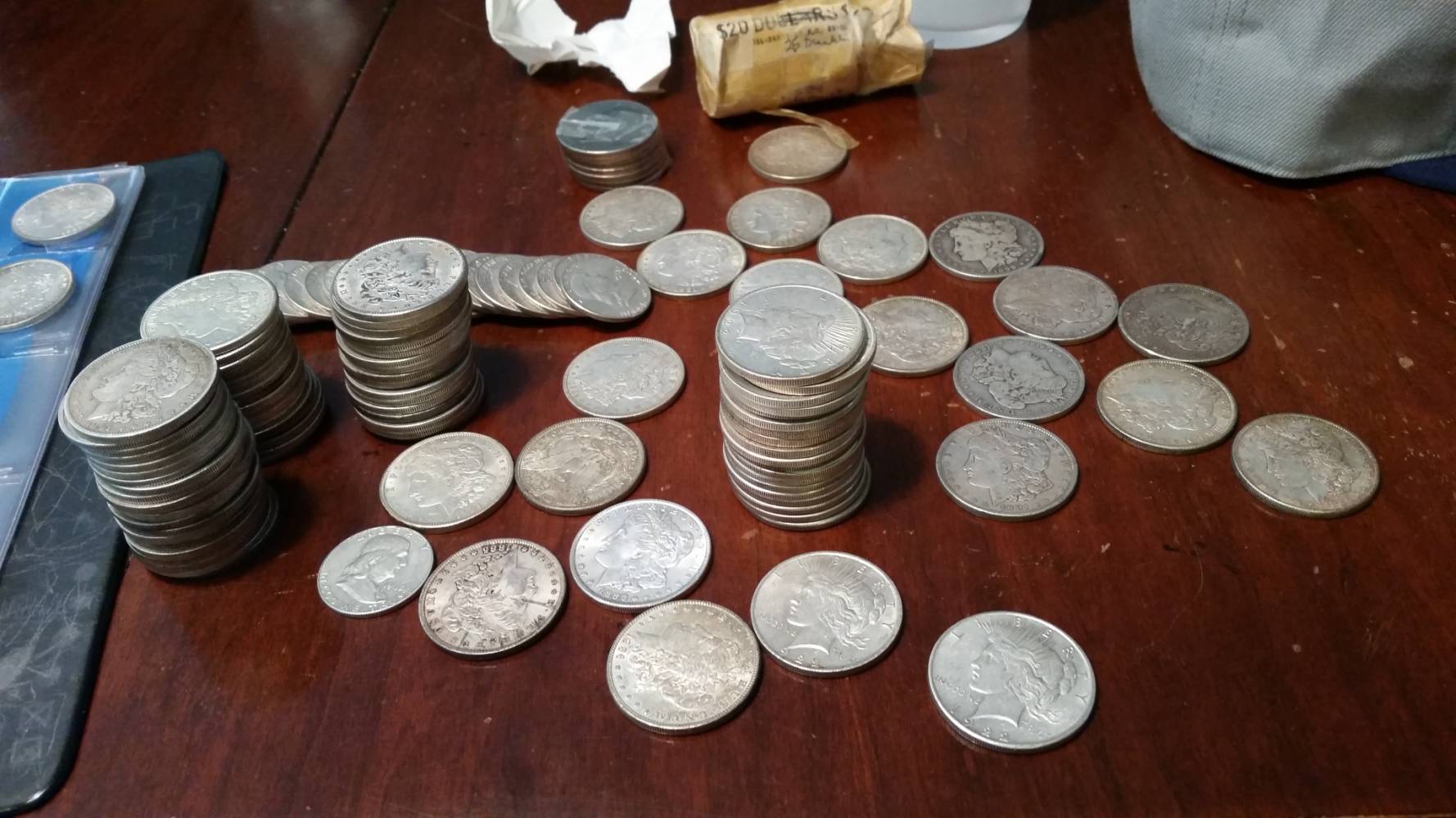 Small-Horde-Of-Morgans-And-Peace-Dollars