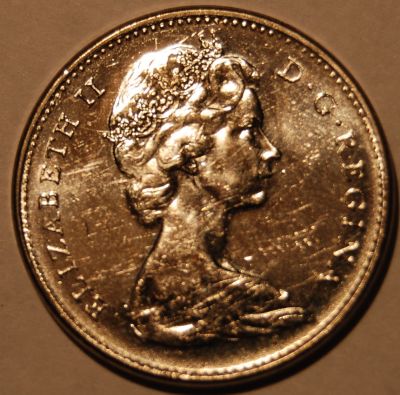 Question:--1965-5-Cents-With-Bungled-Beads
