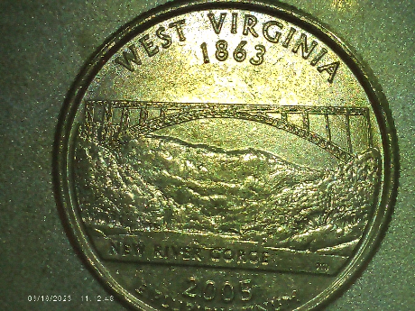 2005-D-W.v.-Quarter-Looks-Like-Weak-Strike-Or-Grease-Event-On-Obverse