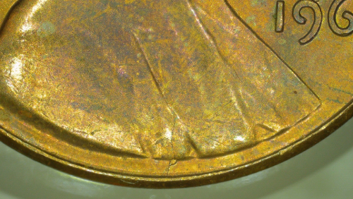 1960-P-LD-LMC-Nice-Die-Crack-Starts-At-Rim-Below-Bust-And-Runs-To-Bowtie-Area