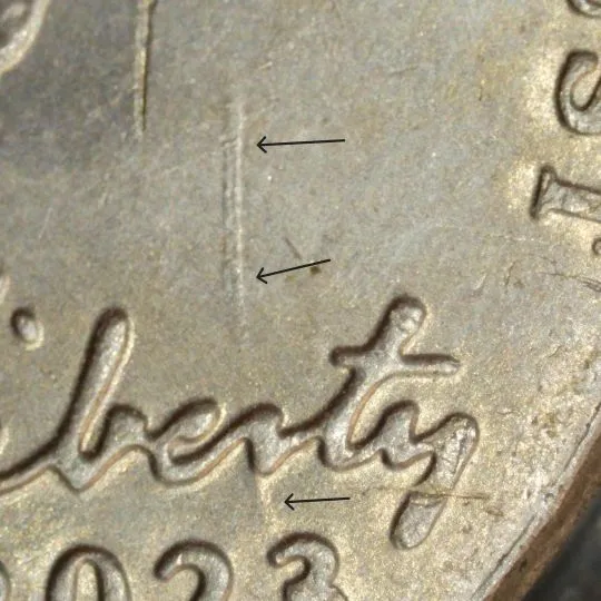 2023-P-Nickel-With-Long-Die-Dent.