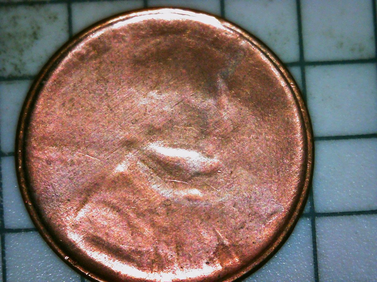 It-Finally-Happened!-Undated-Cent-Struck-Through-Capped-Die?