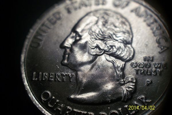 Wyoming-State-Quarter-Reverse-Die-Crack-Or-Extra-Metal?