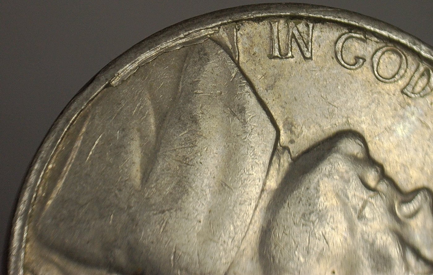 1964-D-Nickel-Delamination-Crack