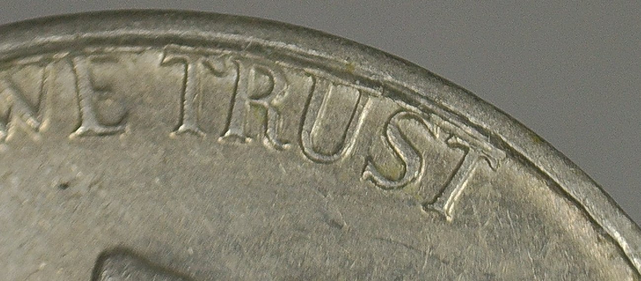 1964-D-Nickel-Delamination-Crack