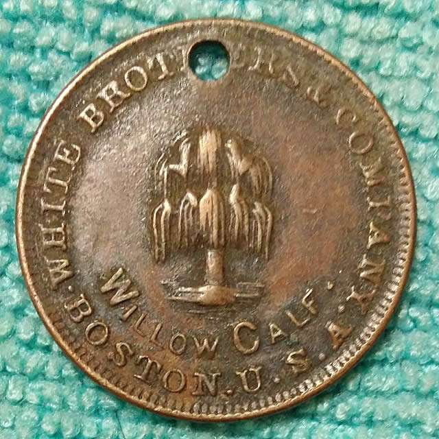 Holed-Coins-Discussion-At-Shop