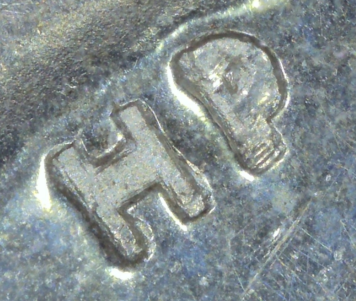 1951-Canadian-Dollar---Triple-Or-Quadruple-Hp?