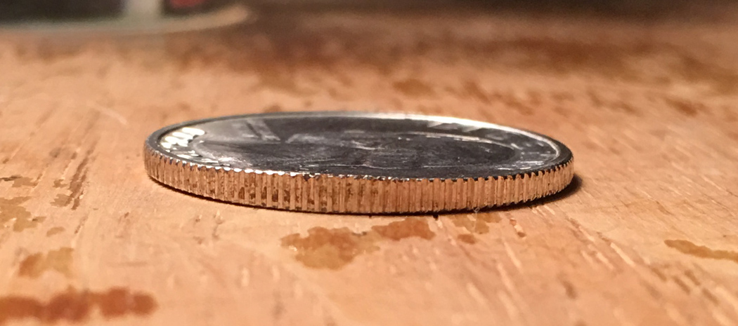Sharp-Oversize-Edge-On-Coin