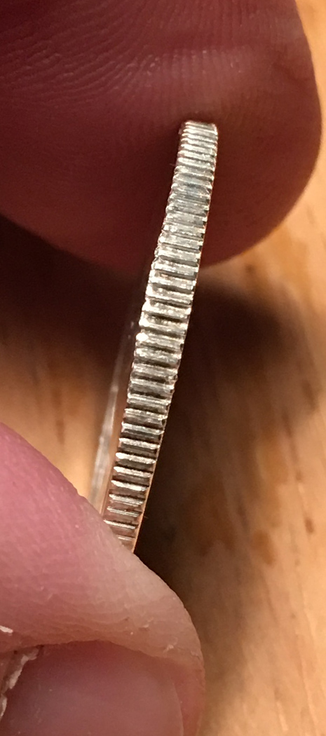 Sharp-Oversize-Edge-On-Coin