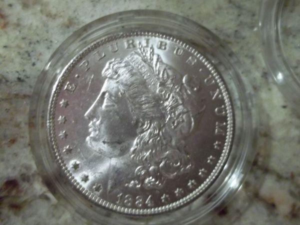 1884-O-X2-And-1887-Morgans