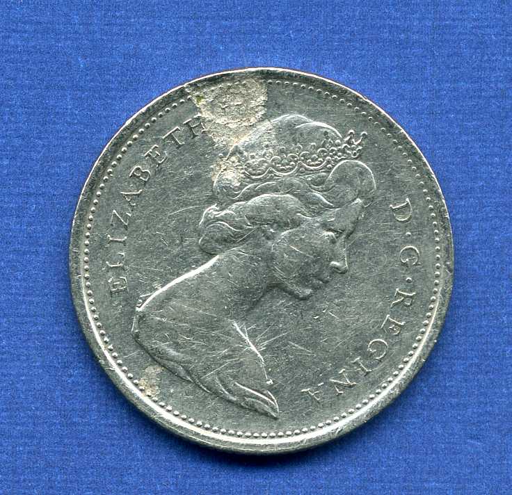 1972-Canada-25-Cents-Struck-Through-Grease
