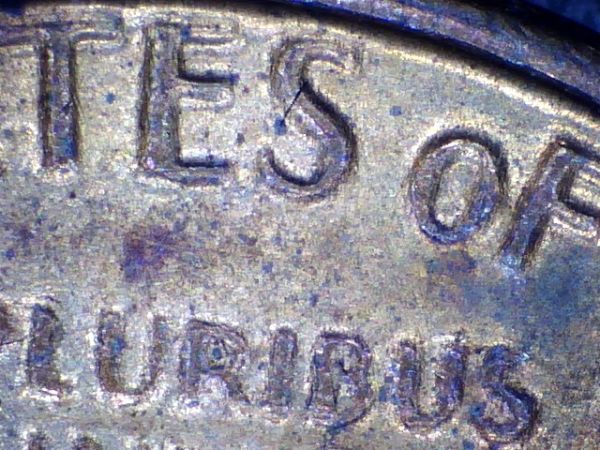 1982-Penny---Blurred-Letters