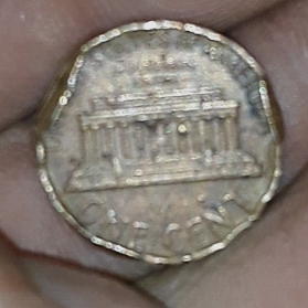 Is-This-A-Possible-1981-Lincoln-Cent-That-Was-Placed-On-A-Foreign-Planchad?