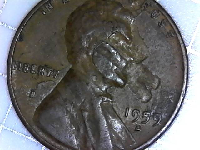 1959-D-LMC-With-Major-Damage-On-The-Obverse.